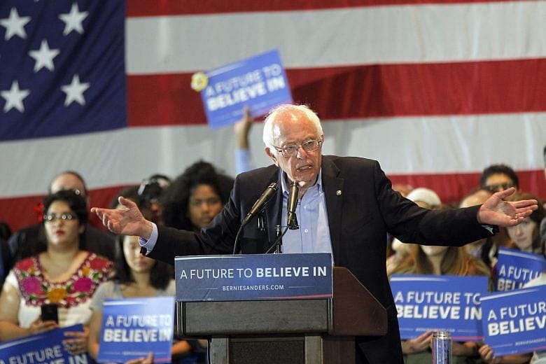 Sanders drops in on Mass. DNC breakfast