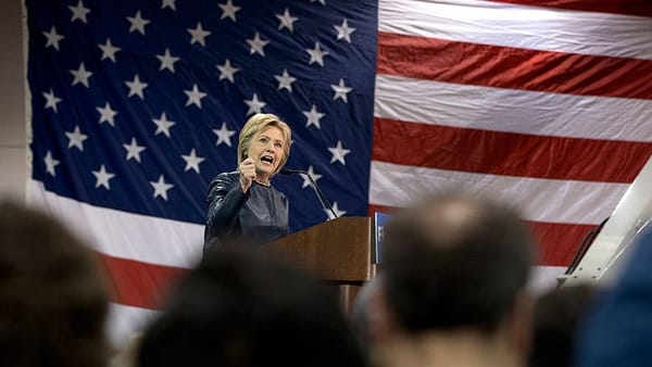Clinton opposes Obama auto parts trade standard