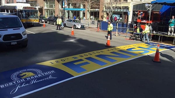 Putting the final touches on the Boston Marathon’s famous finish