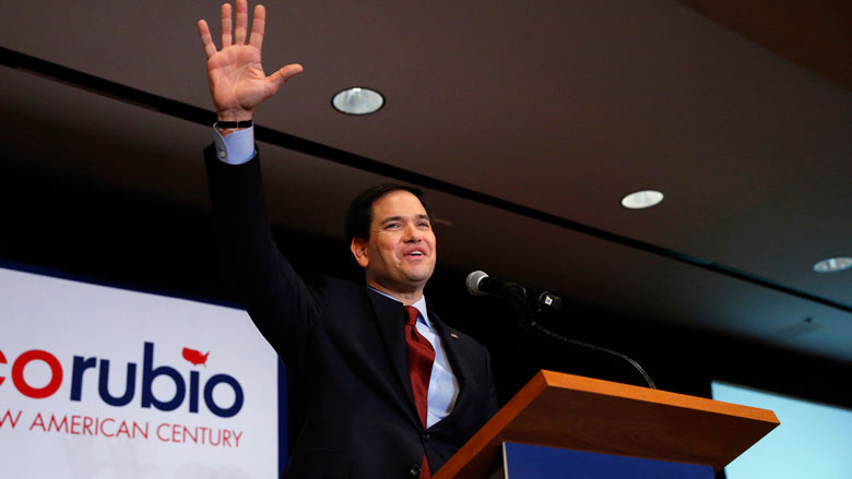 Republican presidential candidate Sen. Marco Rubio, R-Fla., waves to supporters at a caucus night rally Monday, Feb. 1, 2016 in Des Moines, Iowa. (AP Photo/Paul Sancya)