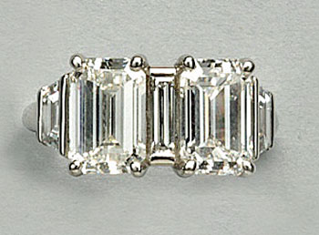 Platinum, twin emerald cut diamonds (Courtesy of Firestone and Parson)
